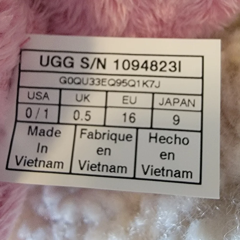 UGG Infant Pink Furry Slippers.   Size 0-1